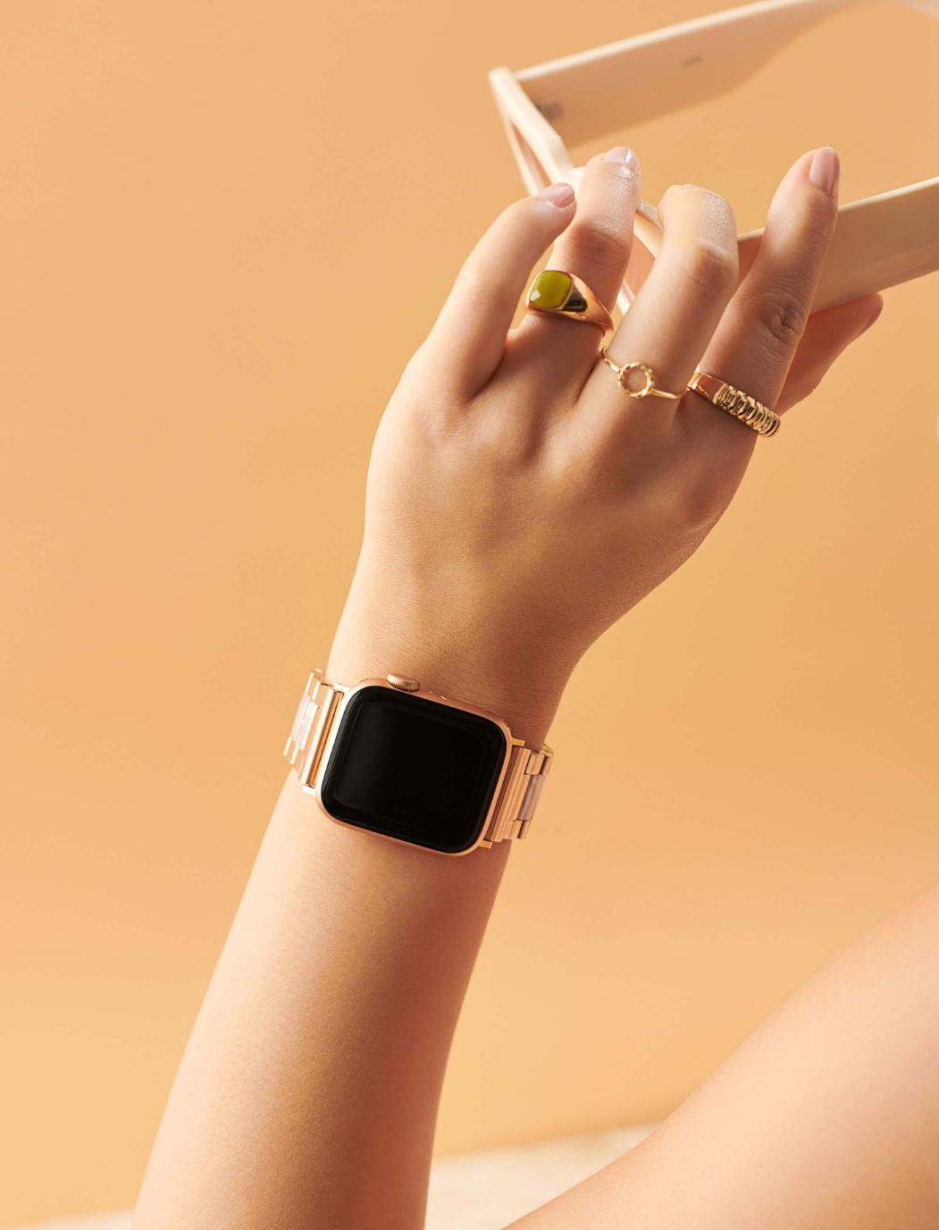 Women's Best Sellers Gold Apple Watch Band - Styled With Gold Rings and Sunglasses